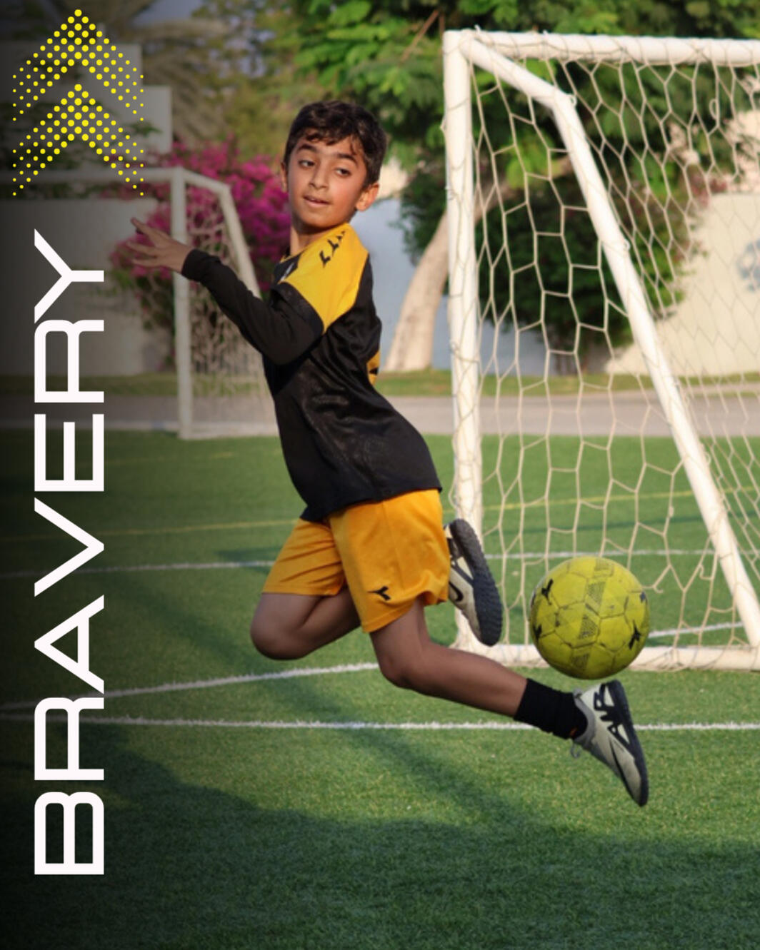 Young player performing a skill on the ABQ Seeb International Pitch